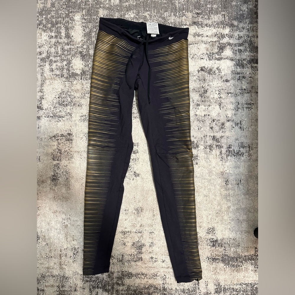 Nike Black and Gold Dri-FIT Leggings